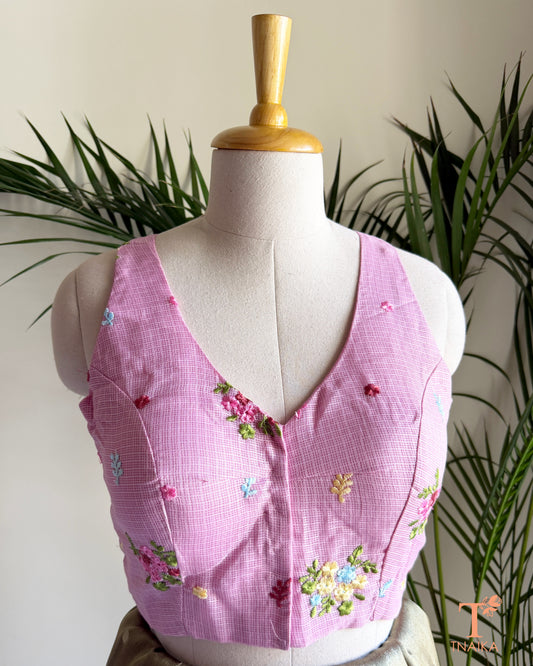 Front view of embroidered Kota silk blouse featuring floral motifs and a flattering V-neck design.