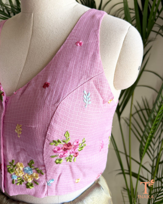 Side view of premium Kota silk saree blouse with intricate floral embroidery and structured silhouette.