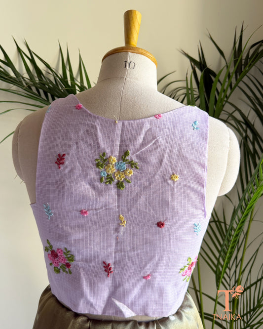 Designer Kota silk blouse with multicolour floral embroidery and elegant high-back silhouette for festive saree styling.