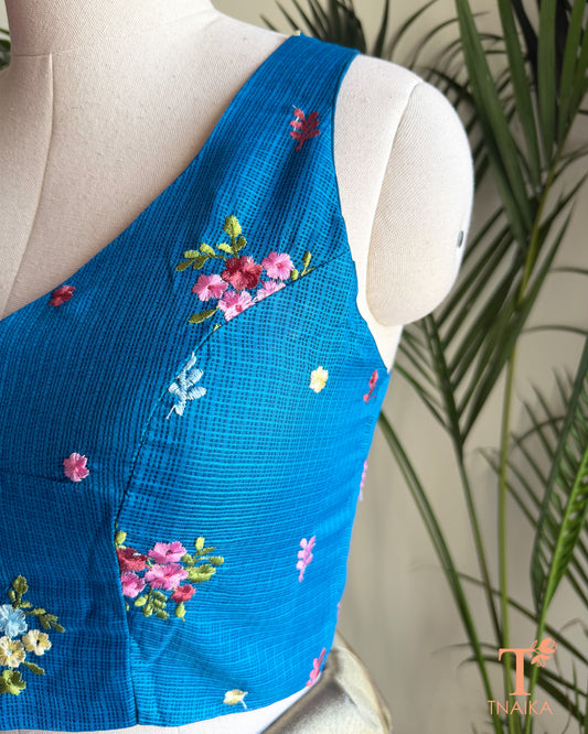 Side view of premium Kota silk saree blouse with intricate floral embroidery and structured silhouette.