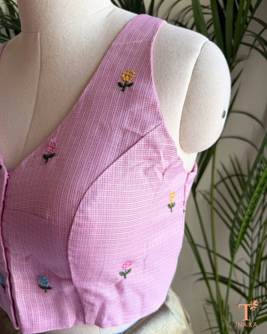 Side view of premium Kota silk saree blouse with intricate floral embroidery and structured silhouette.