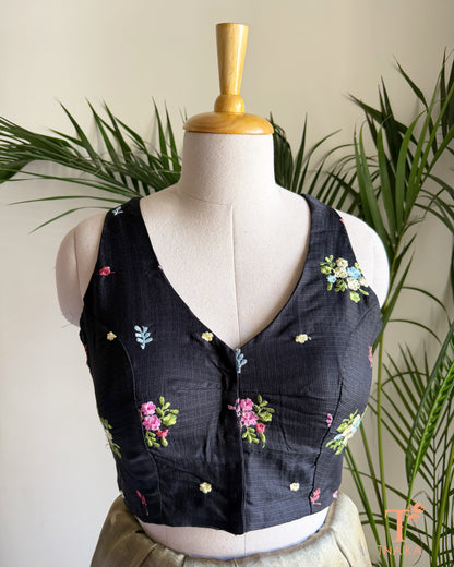 Front view of embroidered Kota silk blouse featuring a flattering V-neckline and intricate floral embroidery detailing.