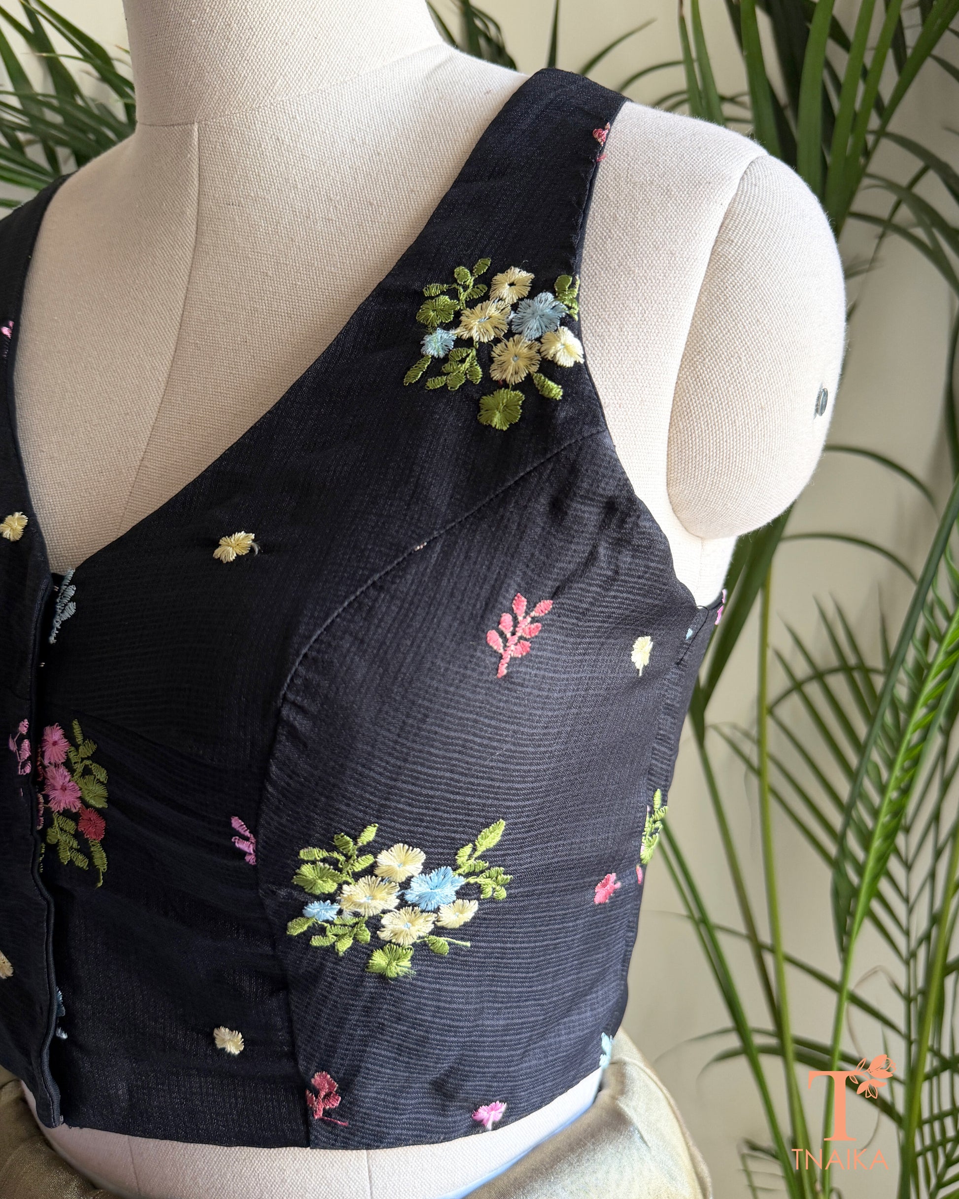 Designer Kota silk blouse with multicolour floral embroidery and elegant high-back silhouette for festive saree styling.