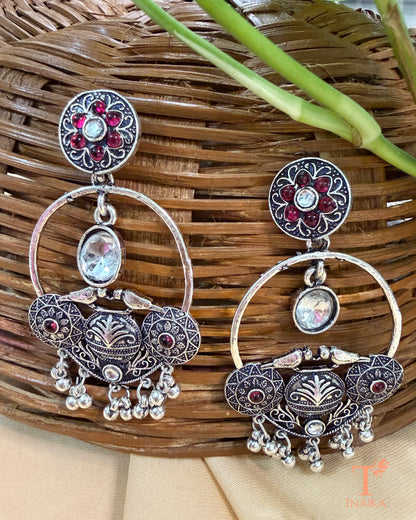 Ethnic oxidised hoop earrings with stone embellishments and vintage-inspired design.
