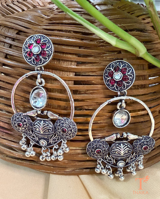 Ethnic oxidised hoop earrings with stone embellishments and vintage-inspired design.