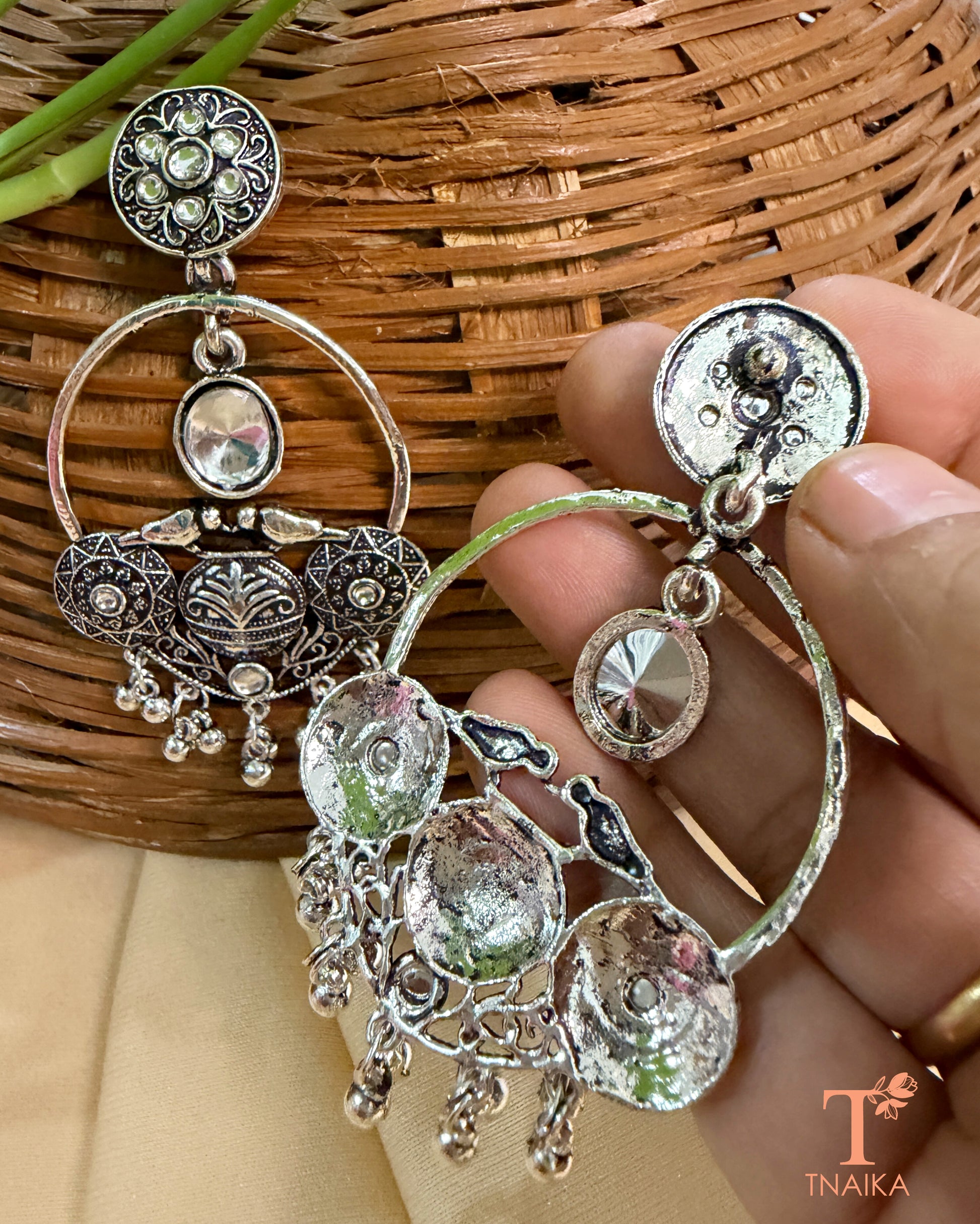 Ethnic oxidised hoop earrings with stone embellishments and vintage-inspired design.