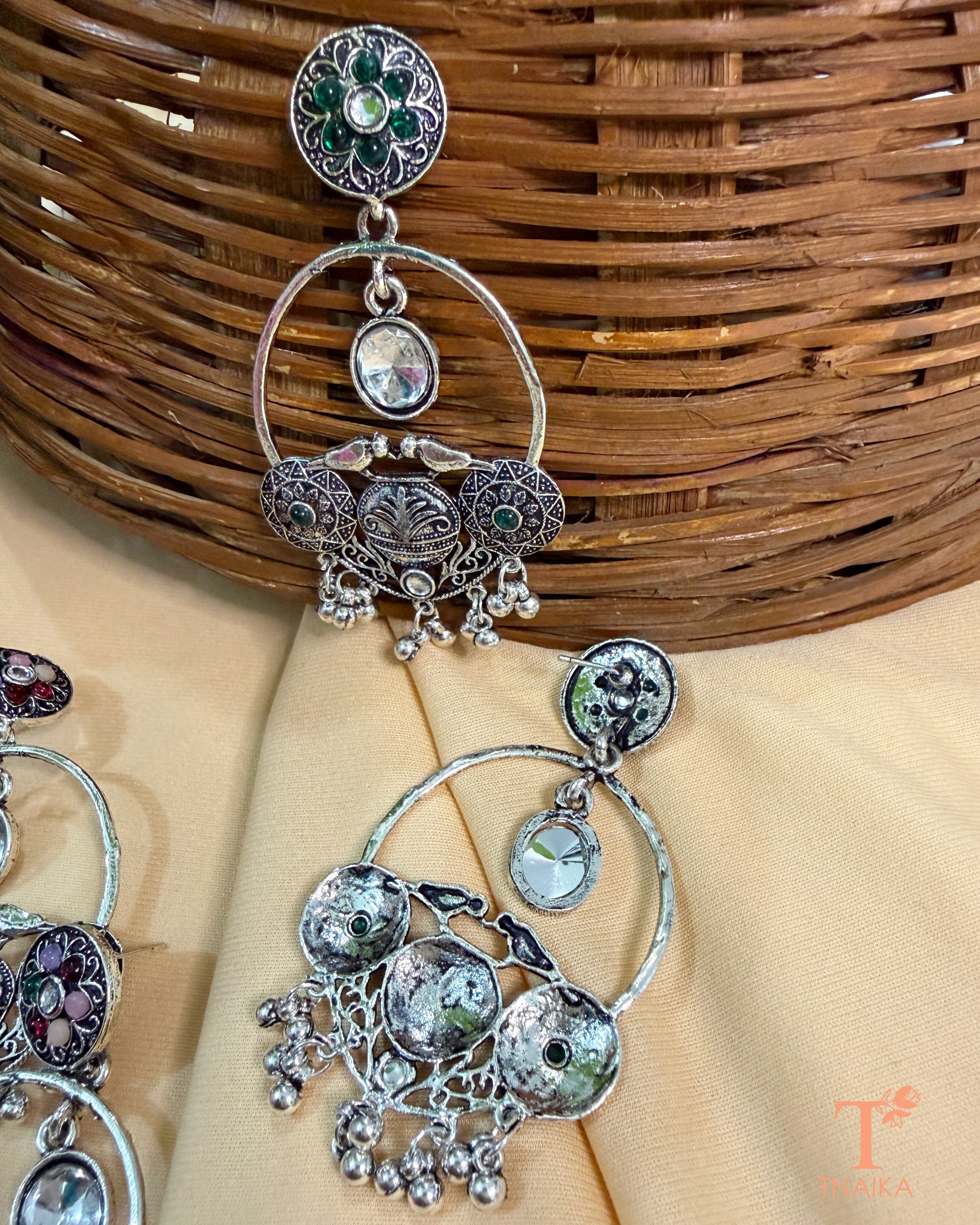 Ethnic oxidised hoop earrings with stone embellishments and vintage-inspired design.