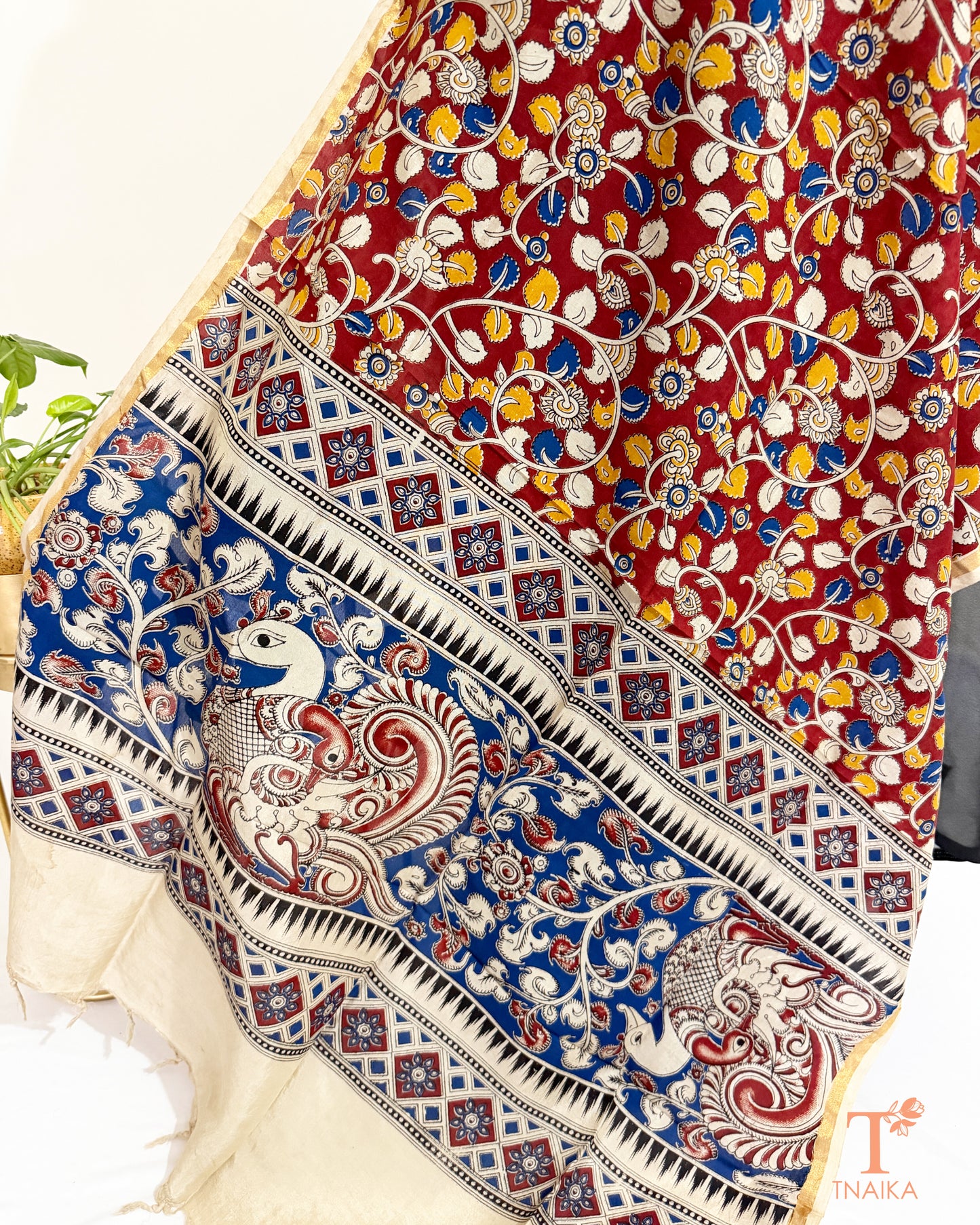 Hand block Kalamkari Nellore silk blend dupatta with fine zari border, traditional artisan prints and soft tassel detailing.