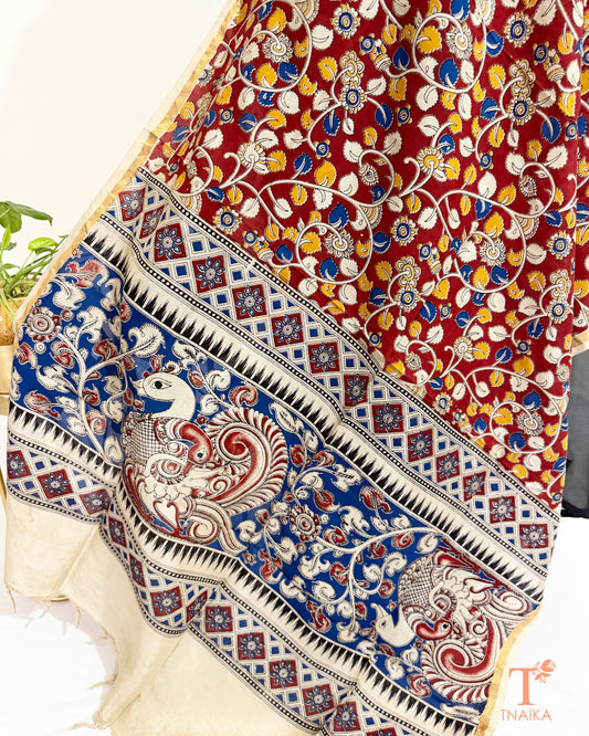Hand block Kalamkari Nellore silk blend dupatta with fine zari border, traditional artisan prints and soft tassel detailing.