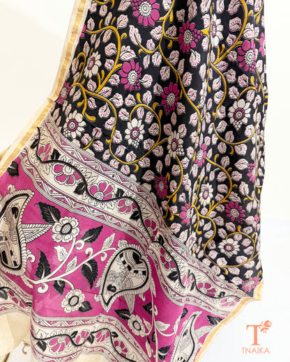 Premium Nellore silk blend hand block Kalamkari dupatta featuring traditional artisan prints, fine zari border and tassel finish.