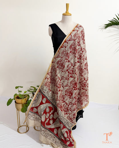 Hand block Kalamkari Nellore silk blend dupatta with fine zari border, traditional artisan prints and soft tassel detailing.