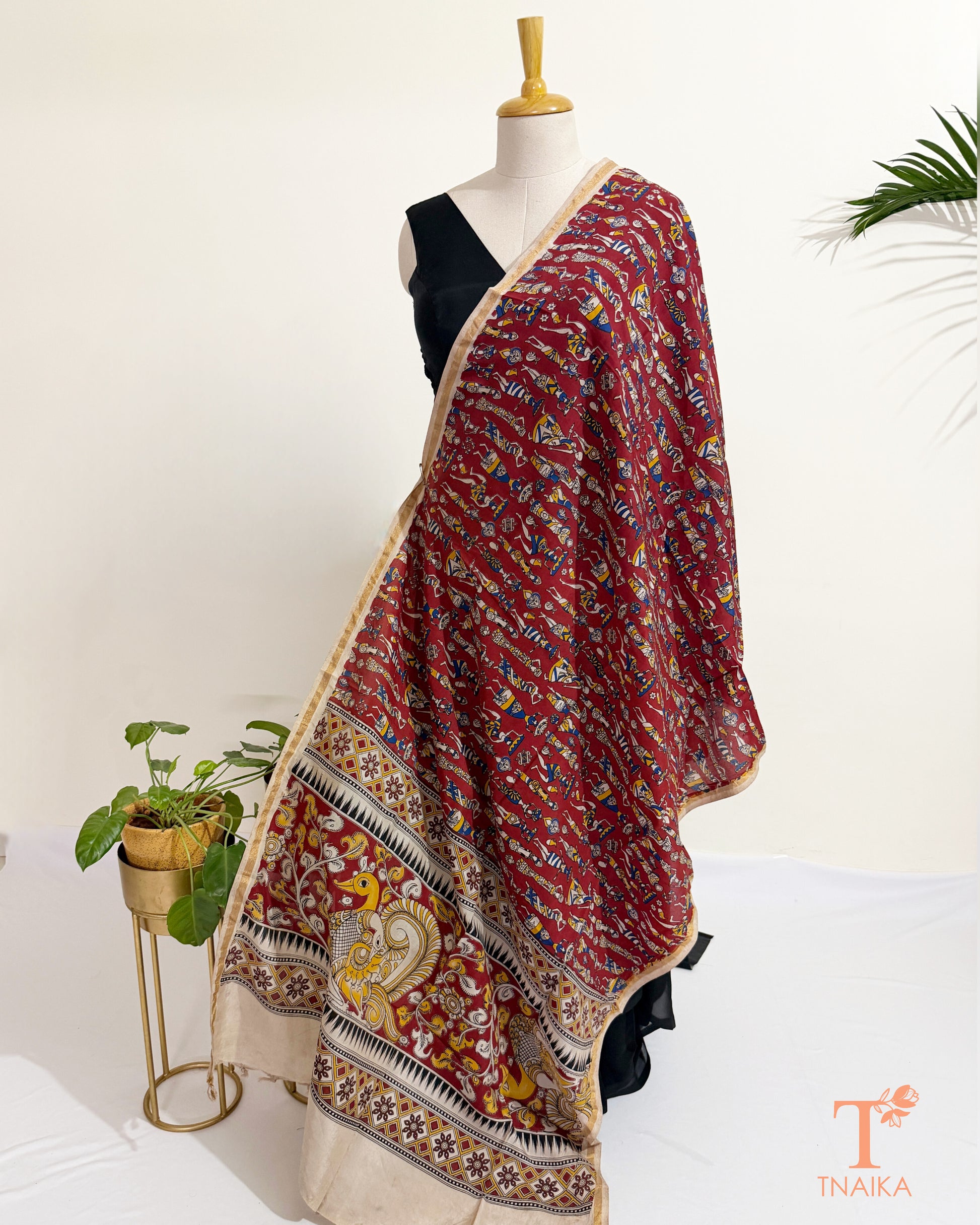 Hand block Kalamkari Nellore silk blend dupatta with fine zari border, traditional artisan prints and soft tassel detailing.