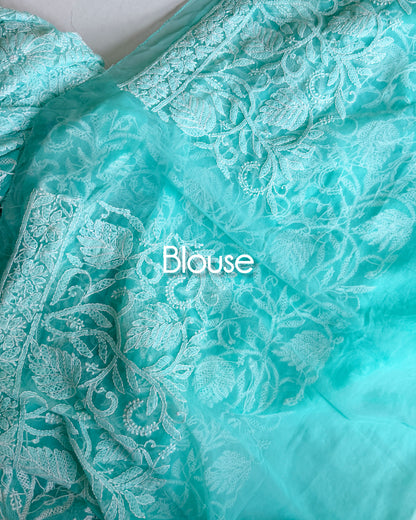 Handcrafted Chikankari saree with running blouse in soft aqua blue with detailed white embroidery