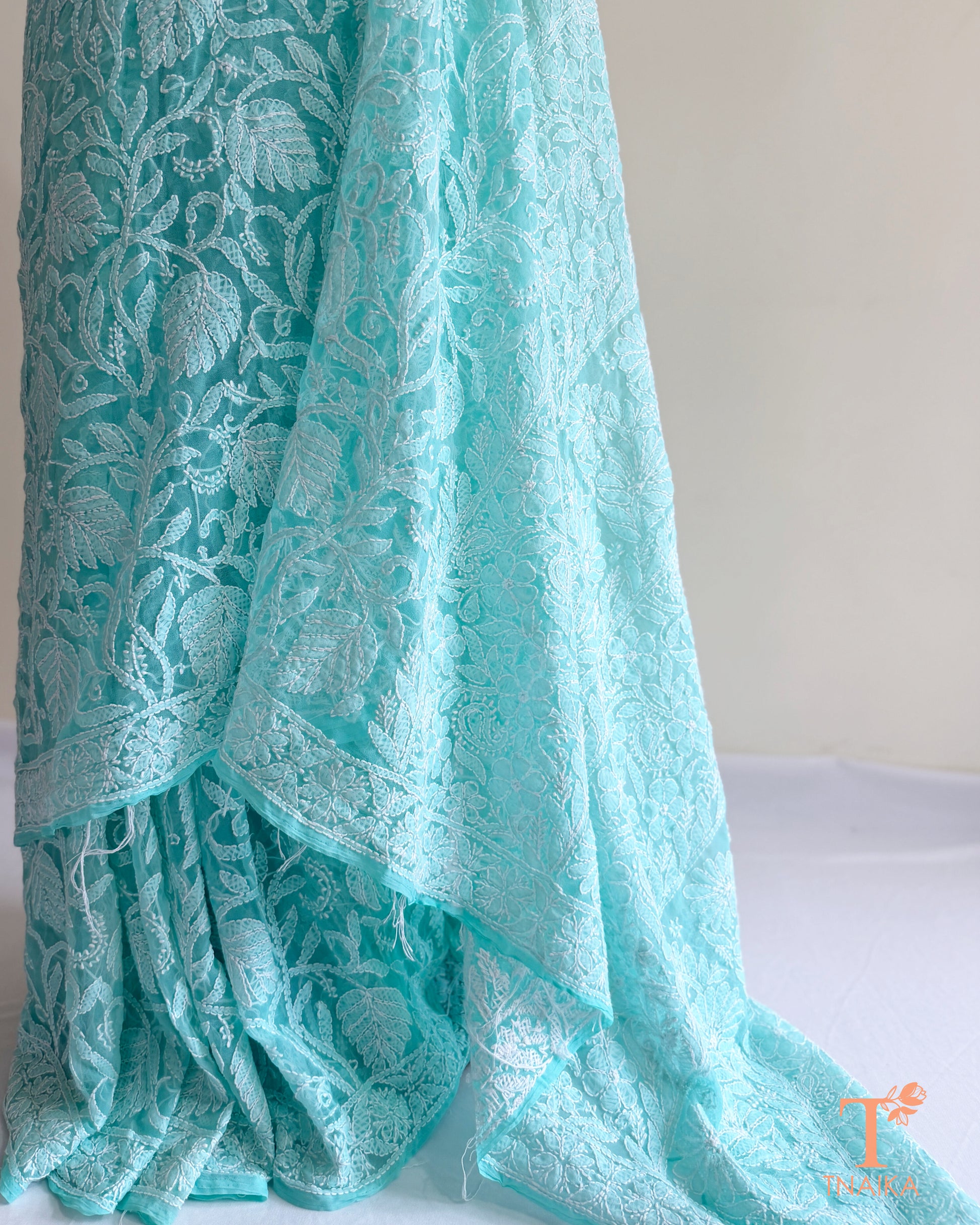 Elegant aqua blue Lucknowi Chikankari saree with full floral embroidery