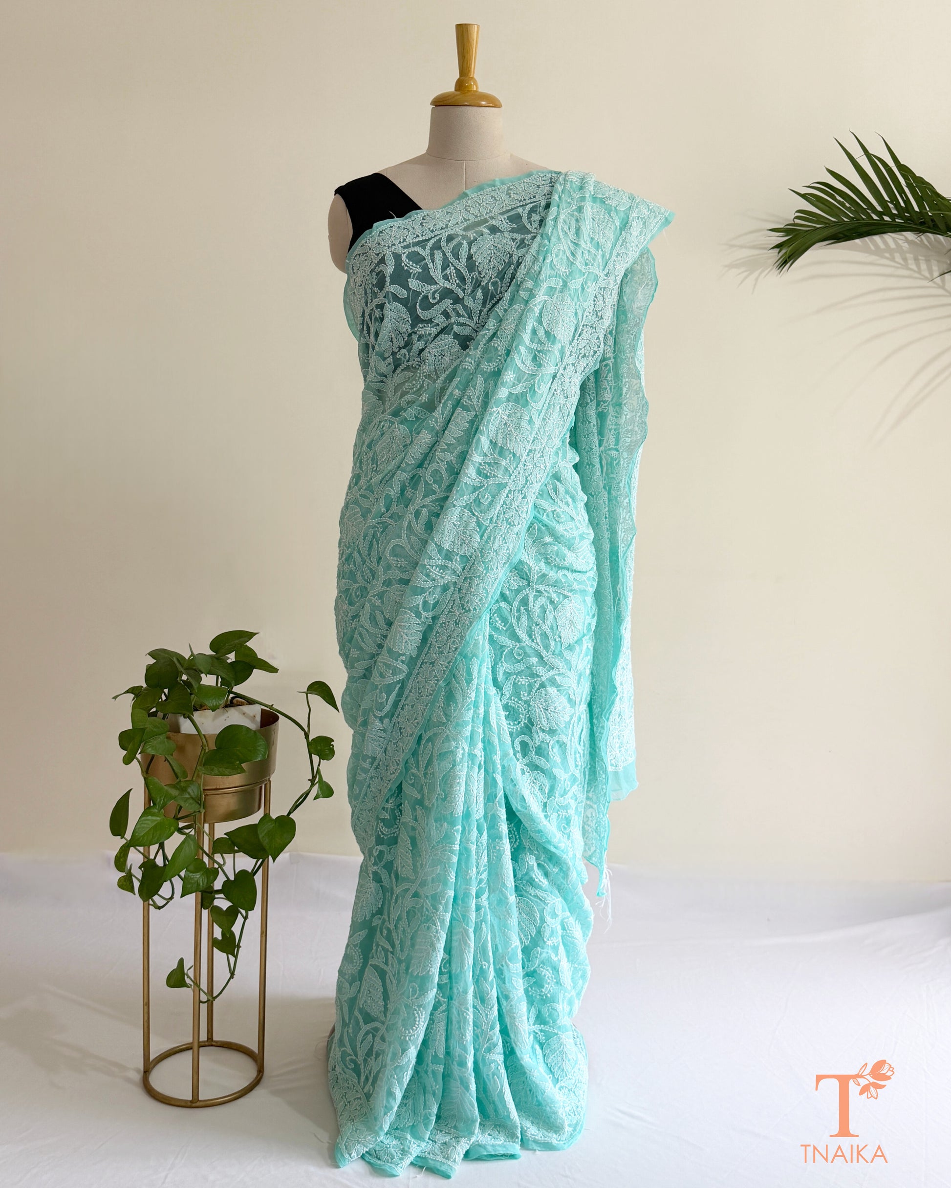 Luxury Lucknowi Chikankari saree in soft aqua blue with intricate embroidery