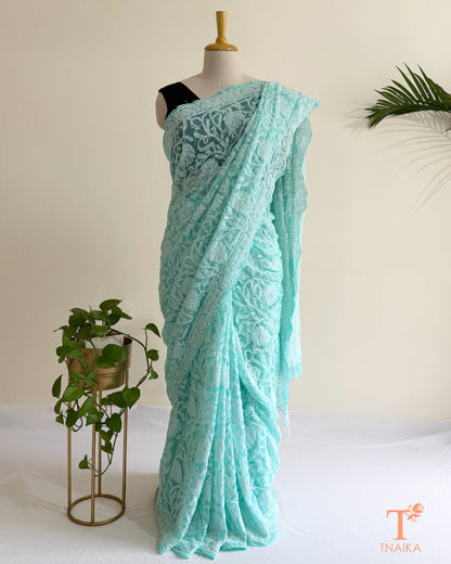 Luxury Lucknowi Chikankari saree in soft aqua blue with intricate embroidery