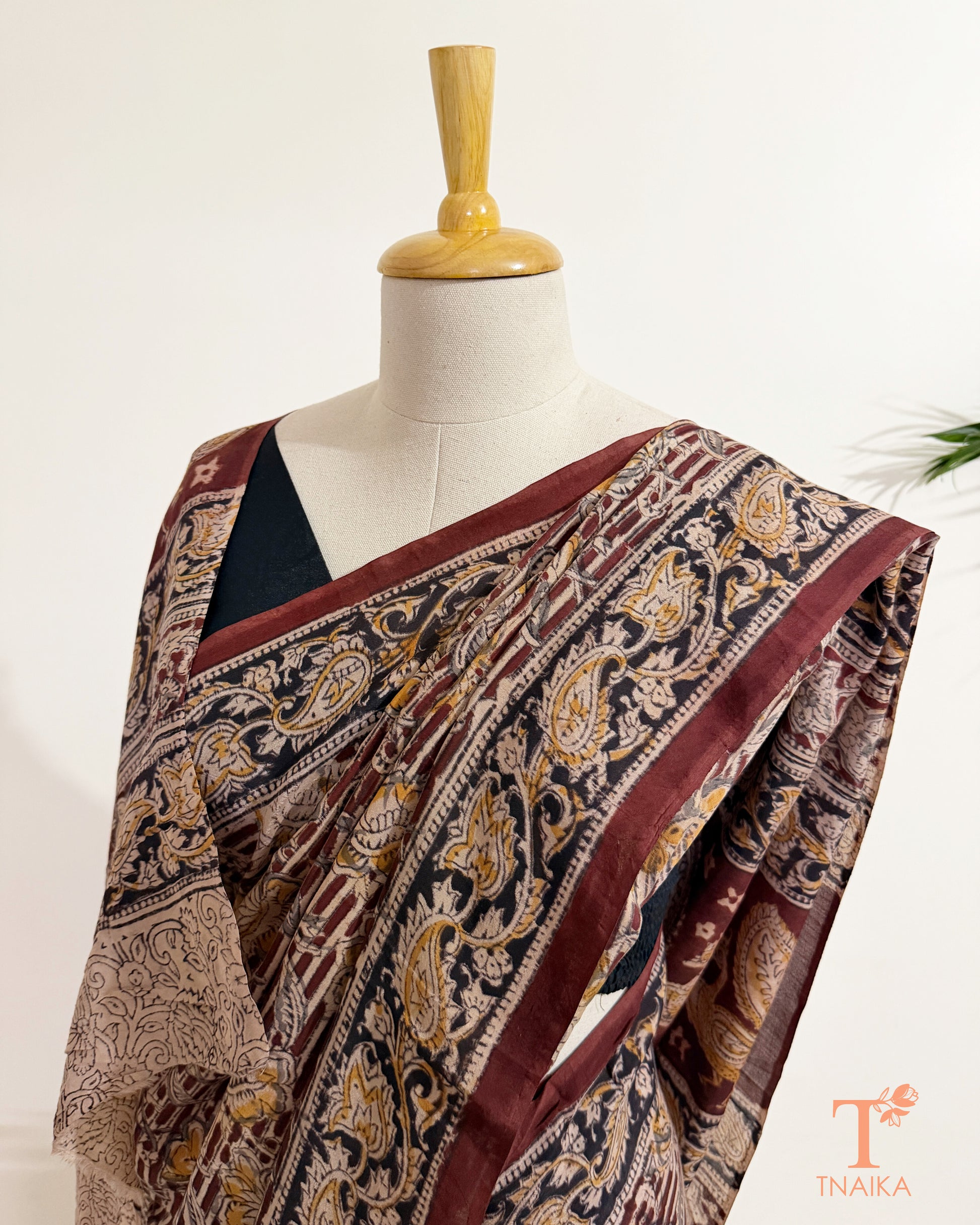 Elegant Kalamkari hand block printed saree with detailed artisan craftsmanship.