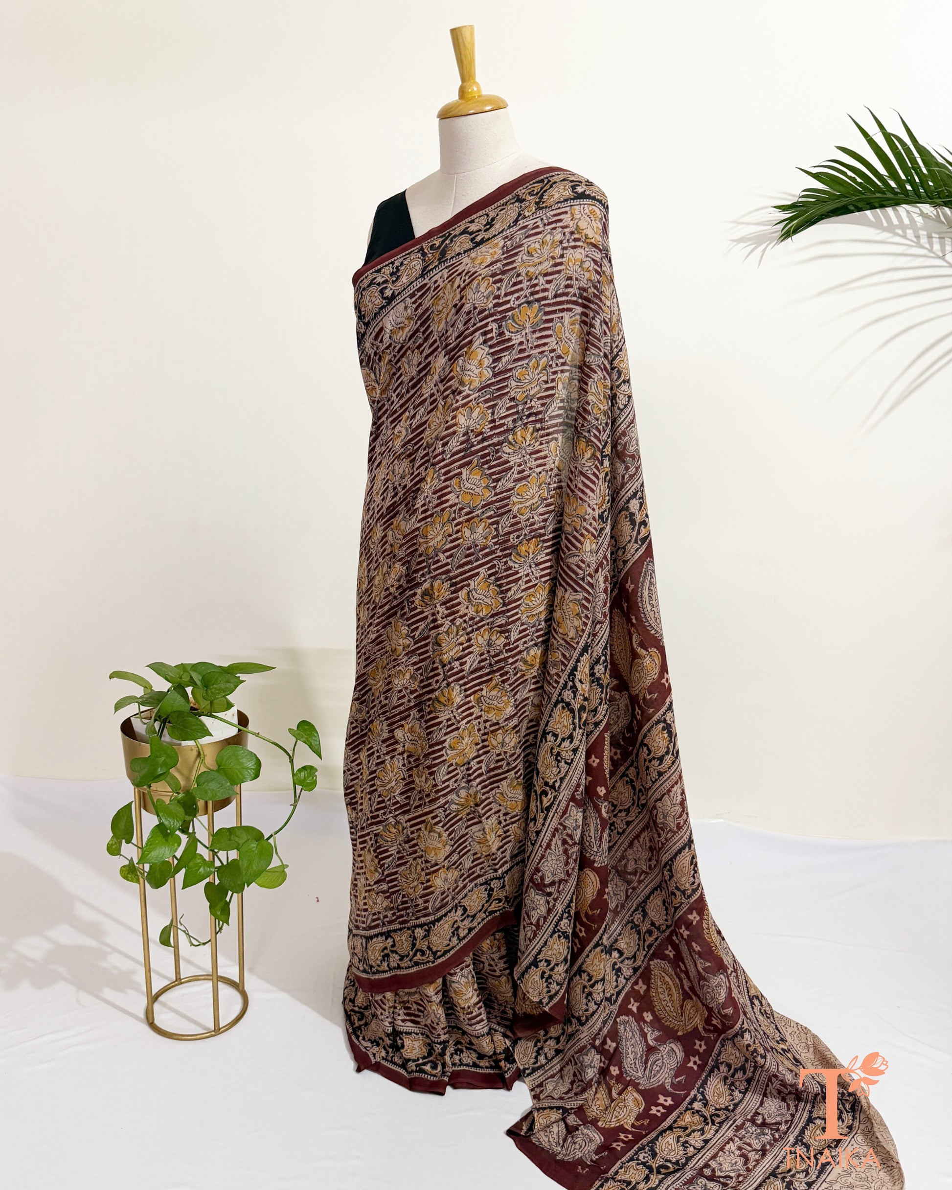 Premium hand block printed Kalamkari saree featuring heritage-inspired floral patterns.