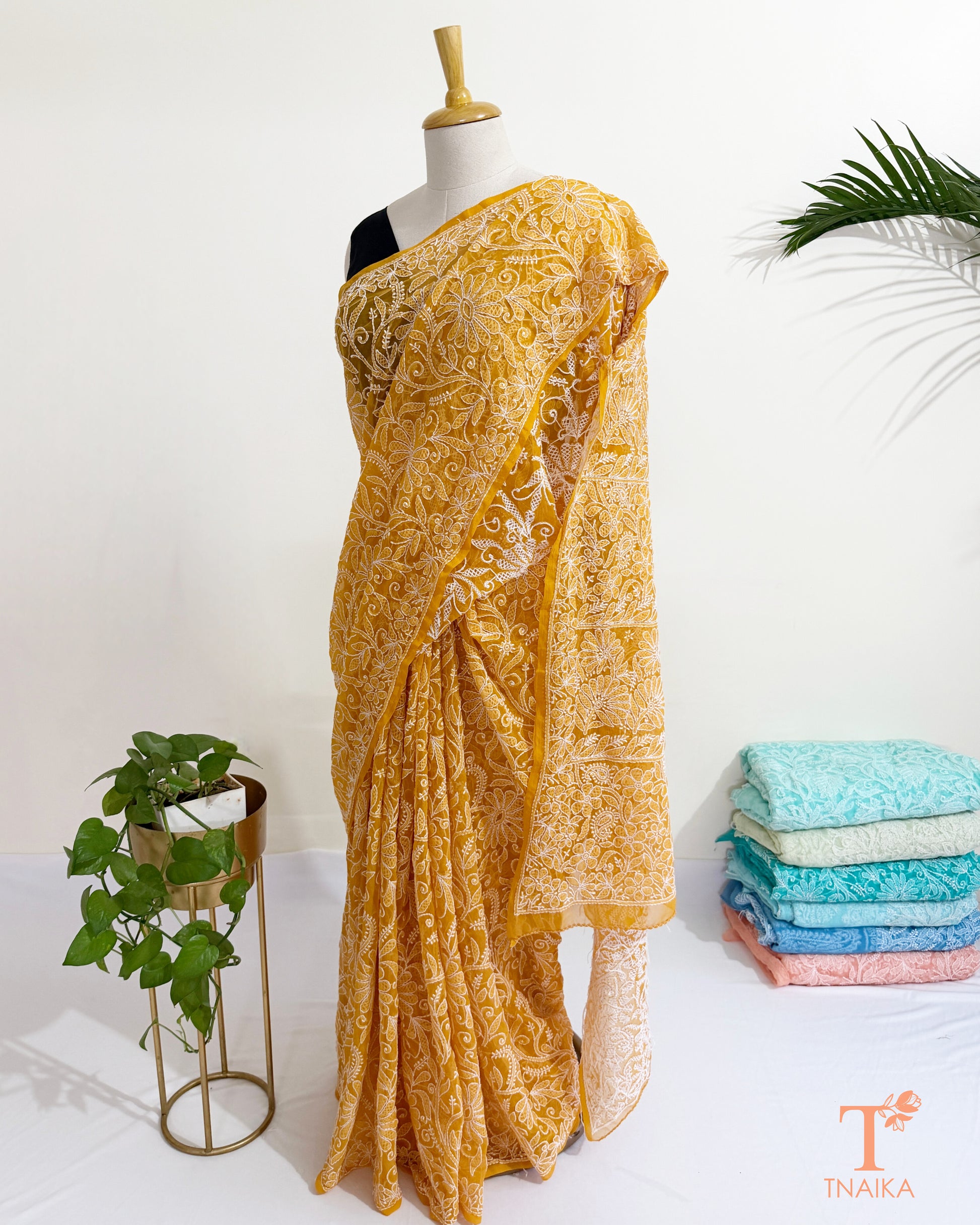 Handcrafted Lucknowi Chikankari saree in mustard yellow georgette.