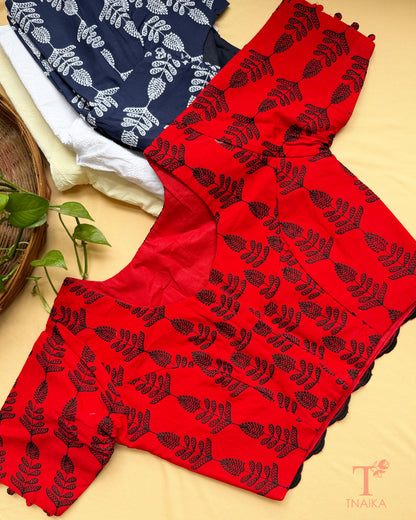 Designer Chikankari blouse featuring tonal floral embroidery and elbow sleeves.