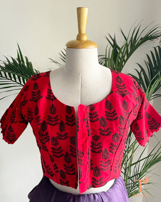 Chikankari machine embroidered blouse with floral thread work and potli button sleeves.
