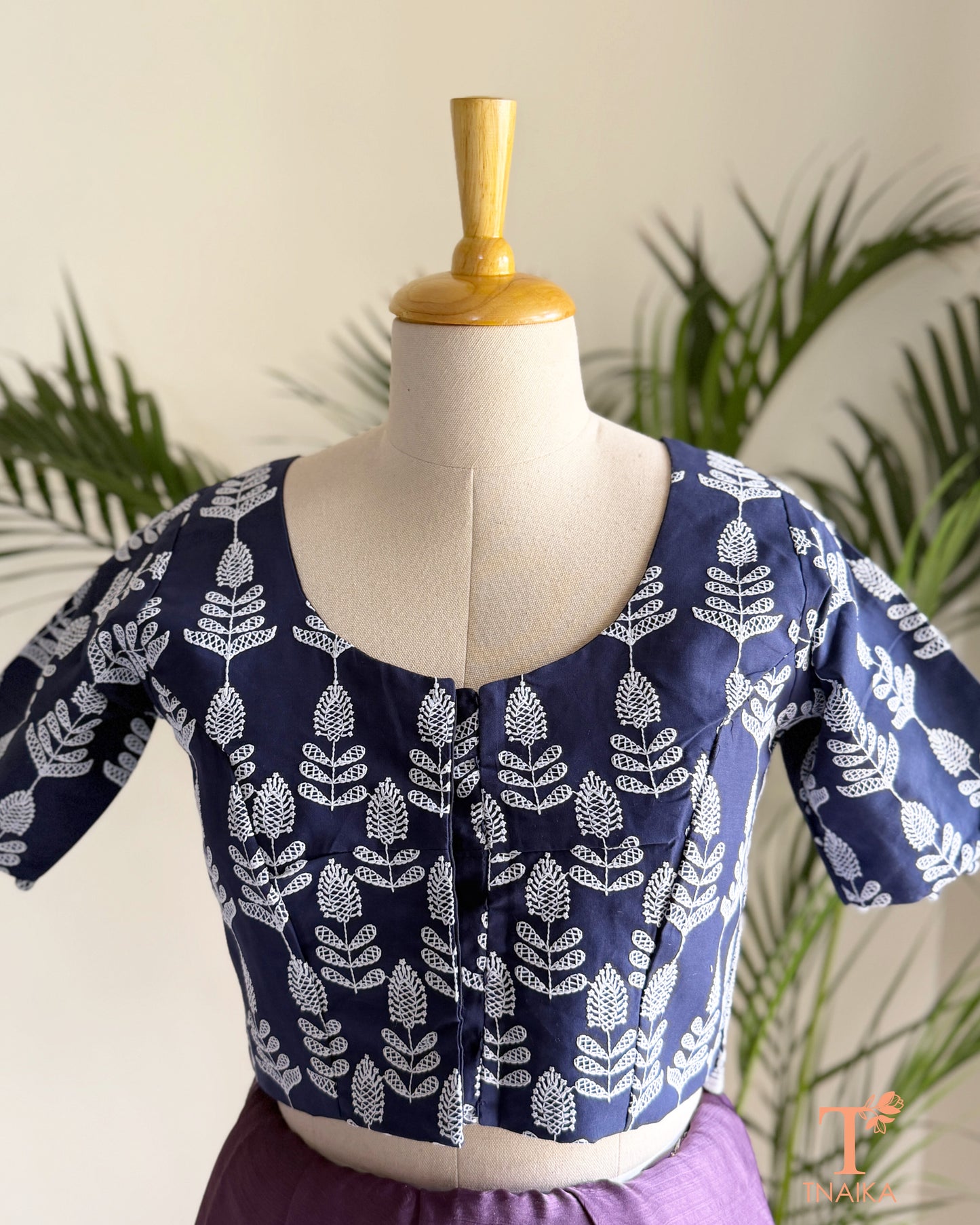 Chikankari-inspired machine embroidered blouse with timeless floral craftsmanship.