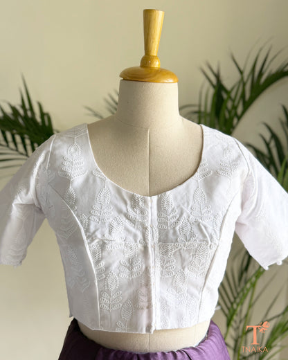 Chikankari-inspired machine embroidered blouse with timeless floral craftsmanship.