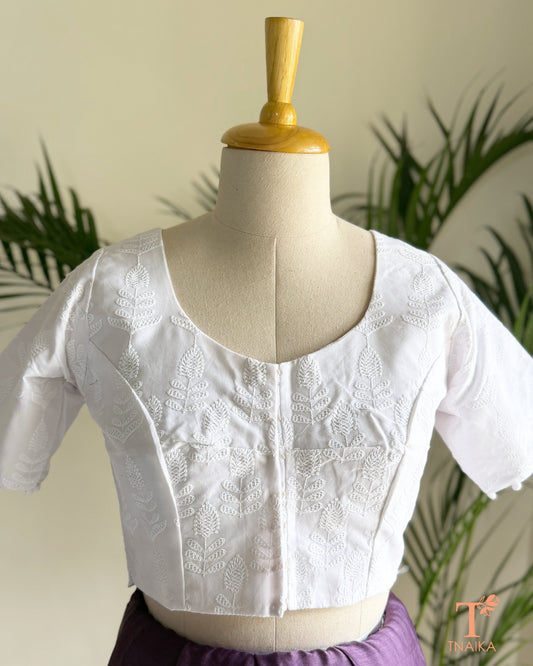 Chikankari-inspired machine embroidered blouse with timeless floral craftsmanship.