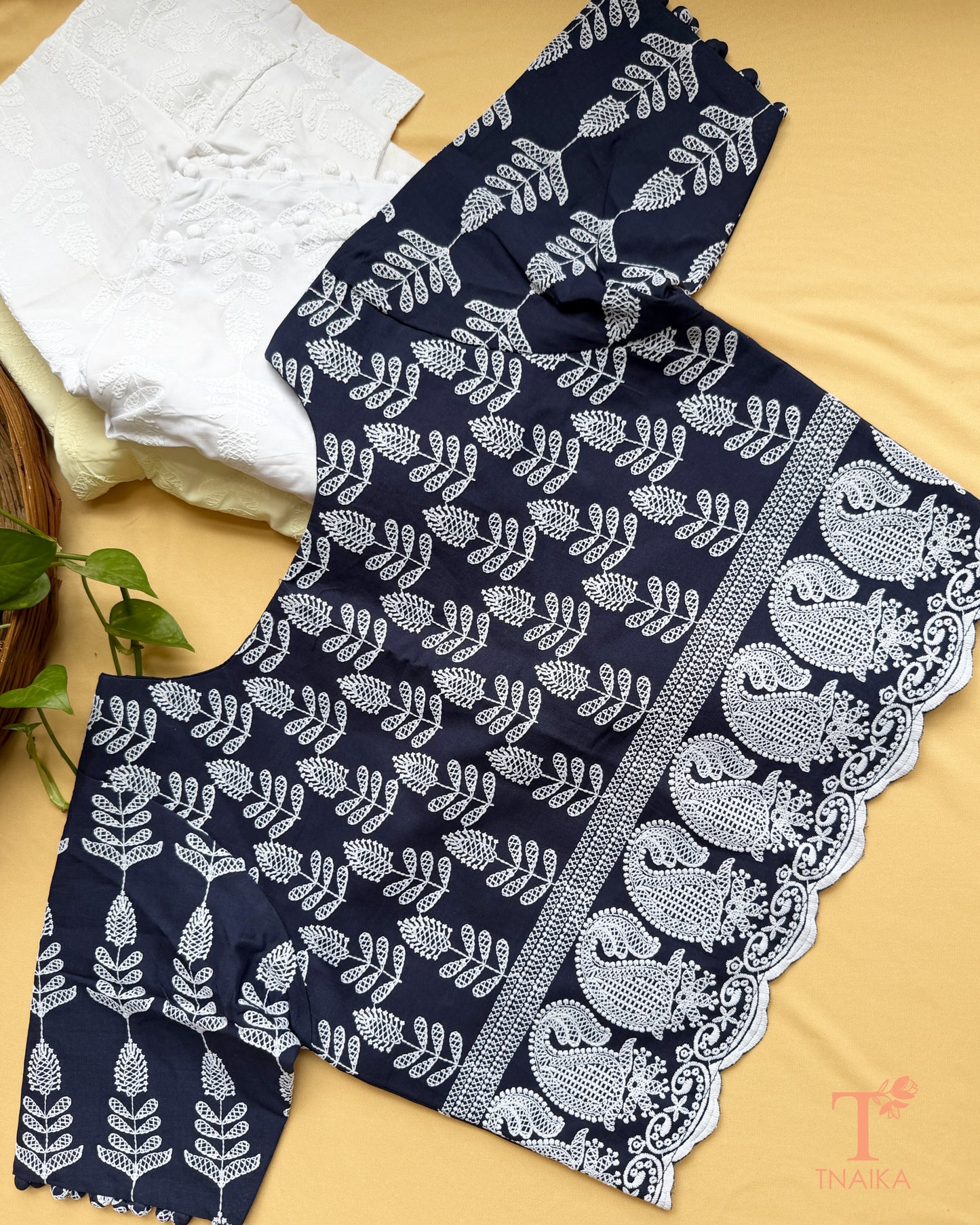 Traditional machine embroidered blouse with intricate floral Chikankari detailing.