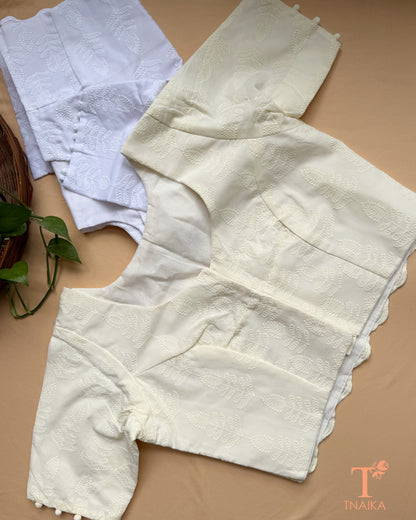 Traditional machine embroidered blouse with intricate floral Chikankari detailing.