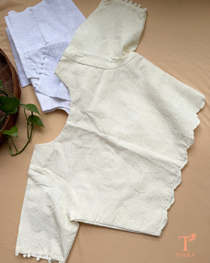 Festive wear Chikankari blouse with tonal embroidery and handcrafted-inspired finish.