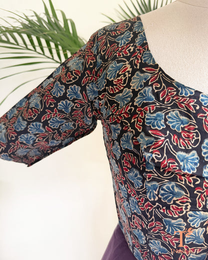 Hand block print modal silk readymade blouse with heritage-inspired motifs and half sleeves.