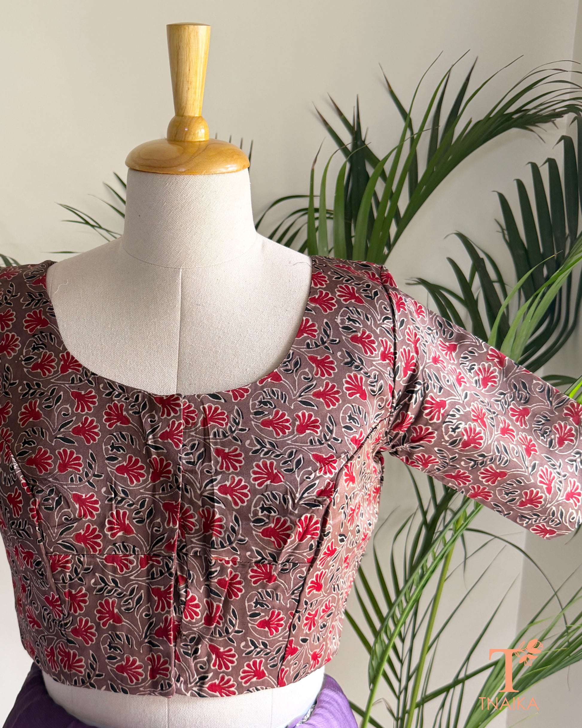 Hand block print modal silk readymade blouse with heritage-inspired motifs and half sleeves.
