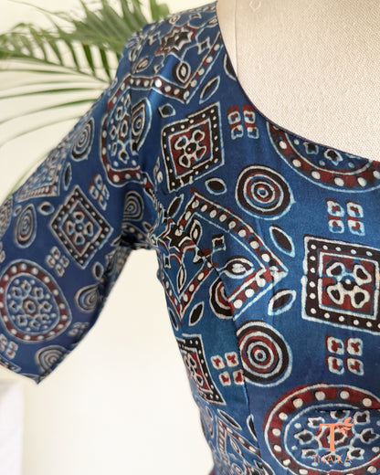 Blue modal silk blouse with heritage geometric hand block print and round neckline.
