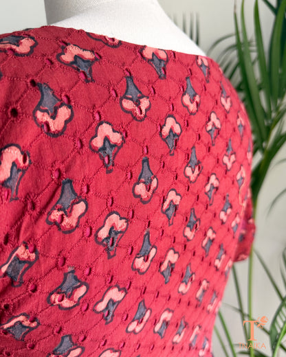 Hakoba cotton blouse with Ajrakh hand block print, eyelet embroidery and V-notch neckline.