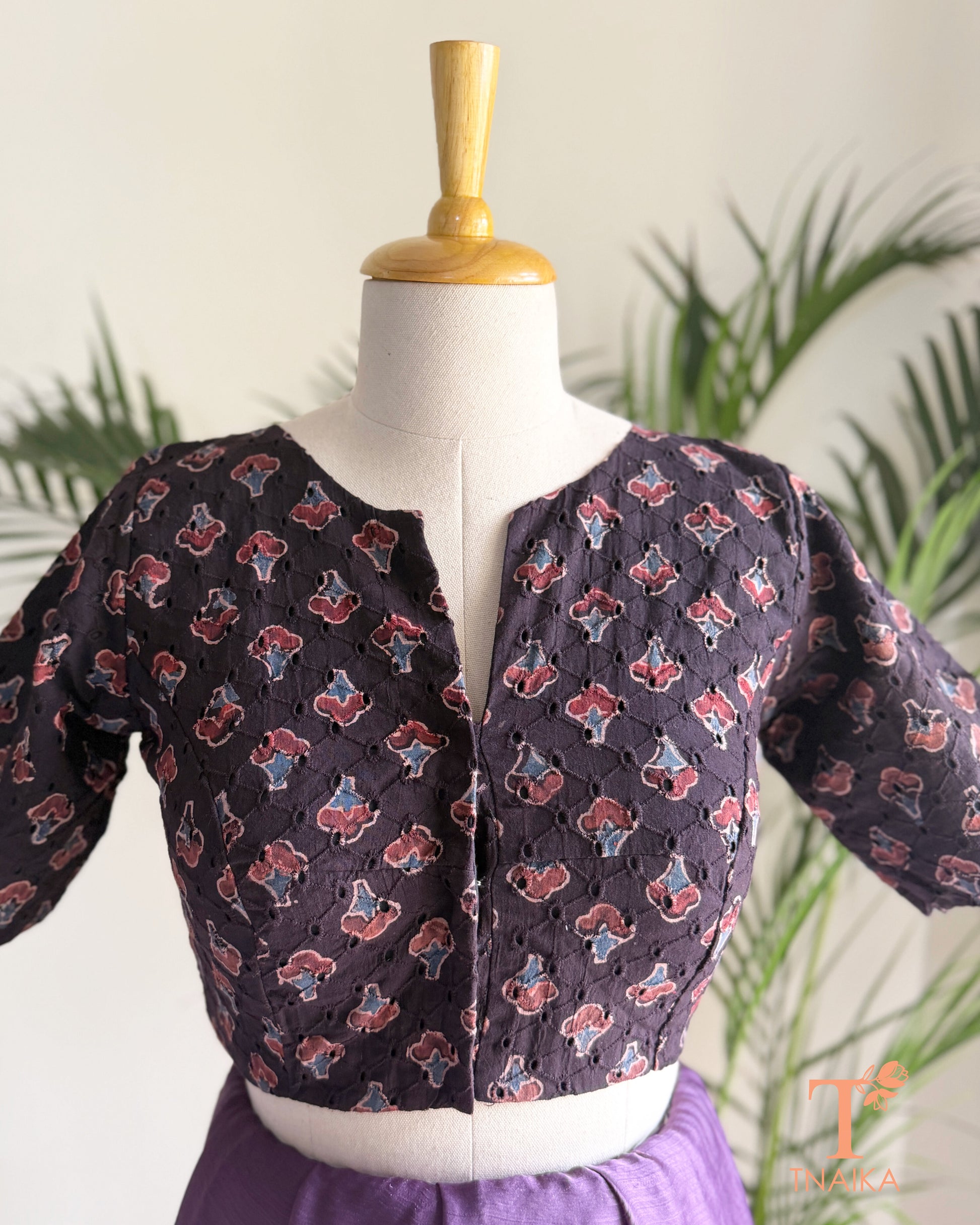 Charcoal black Hakoba blouse with traditional Ajrakh hand block print and embroidered texture.