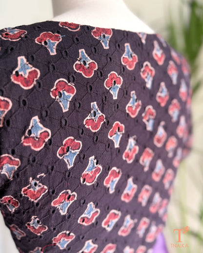Hakoba cotton blouse with Ajrakh hand block print, eyelet embroidery and V-notch neckline.