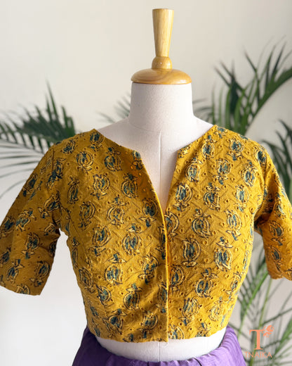 Ajrakh hand block print Hakoba cotton readymade blouse with embroidered eyelet fabric and V-notch neckline.