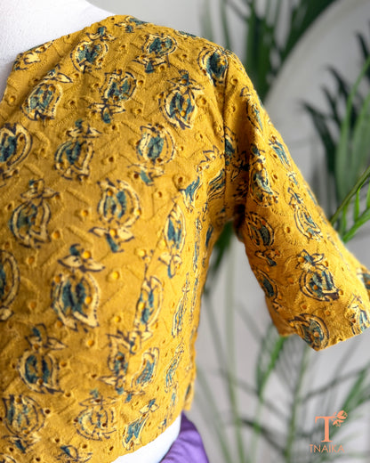 Hakoba cotton blouse featuring authentic Ajrakh hand block printed motifs and eyelet embroidery.
