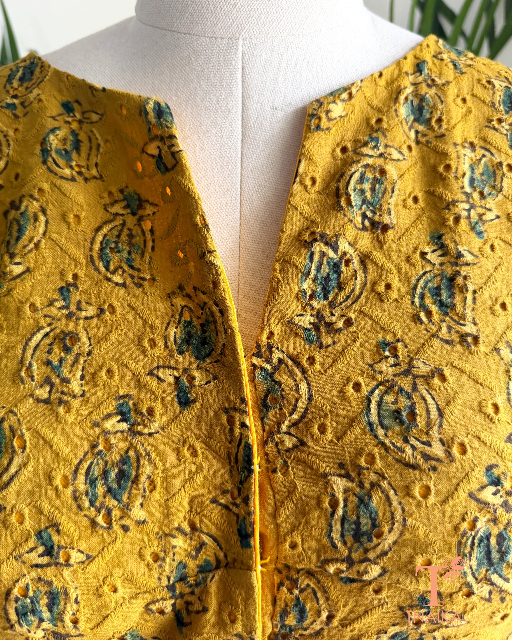 Hakoba cotton blouse with artisan hand block printed motifs and embroidered detailing.
