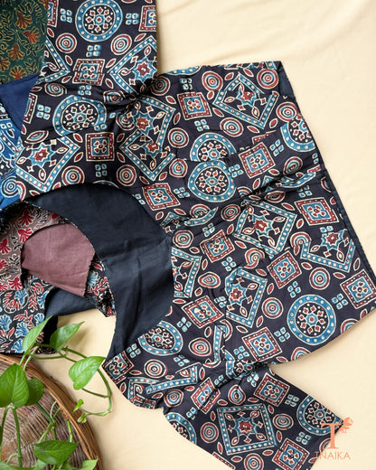 Black modal silk blouse with heritage geometric hand block print and round neckline.