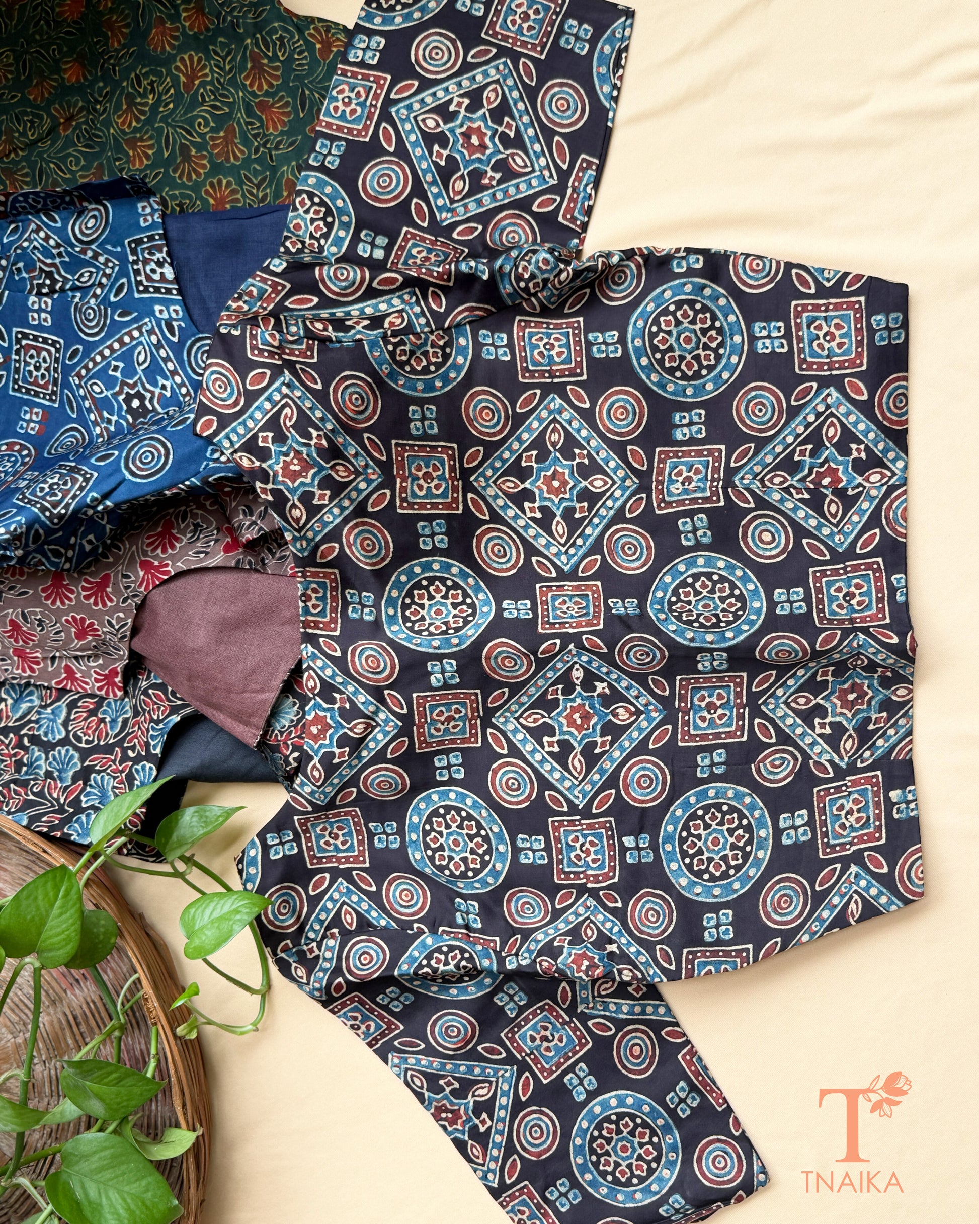 Hand block print modal silk readymade blouse with heritage-inspired motifs and half sleeves.