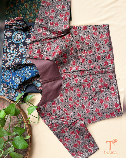 Close-up of hand block print modal silk blouse sleeve showing artisan-inspired motifs.
