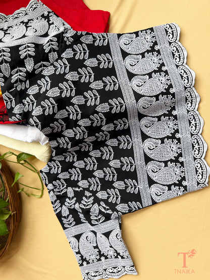 Traditional embroidered blouse with Chikankari-inspired thread work and elbow-length sleeves.