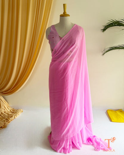 Lightweight plain georgette saree for festive and everyday wear.