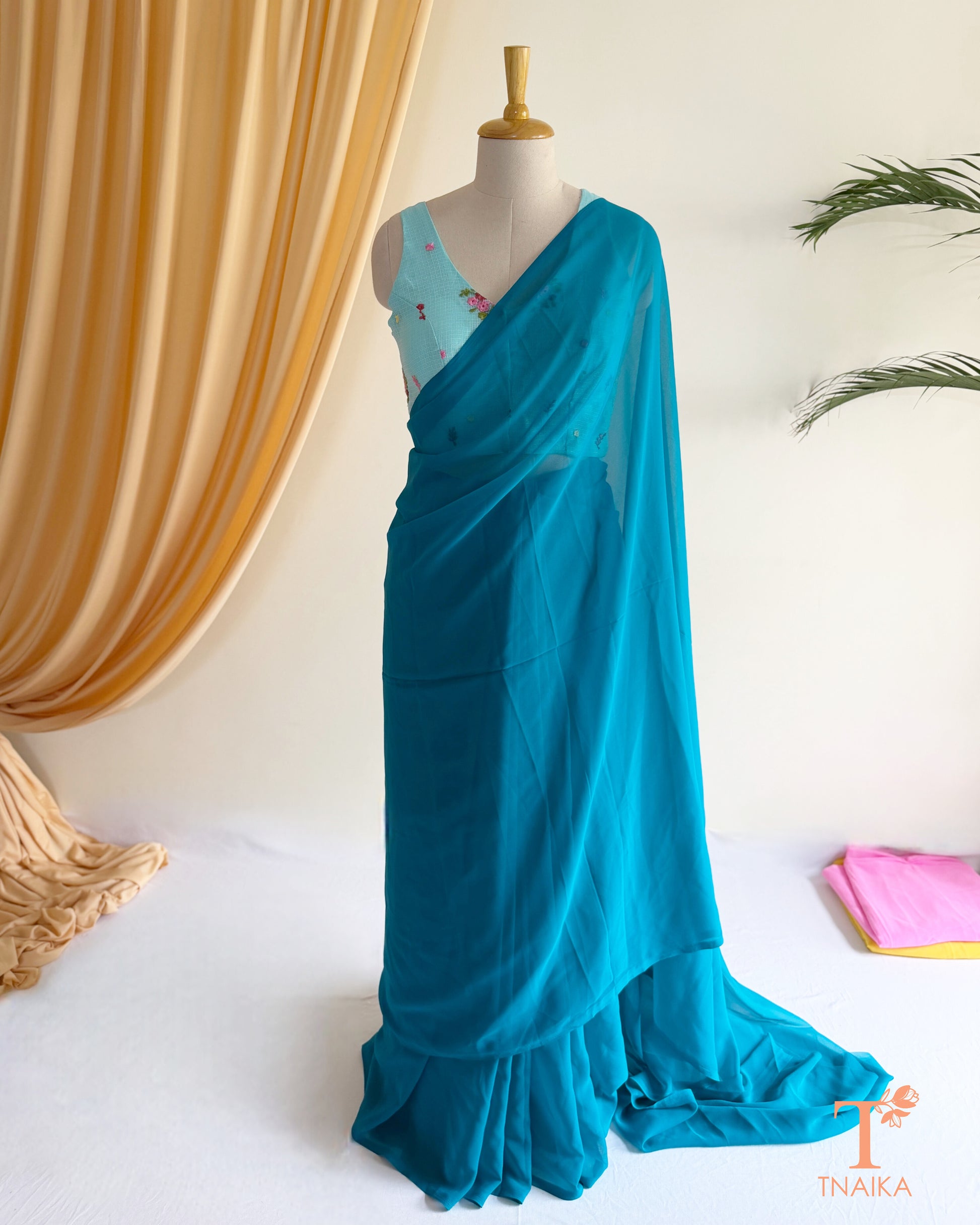 Premium soft georgette saree with an elegant flowing drape.