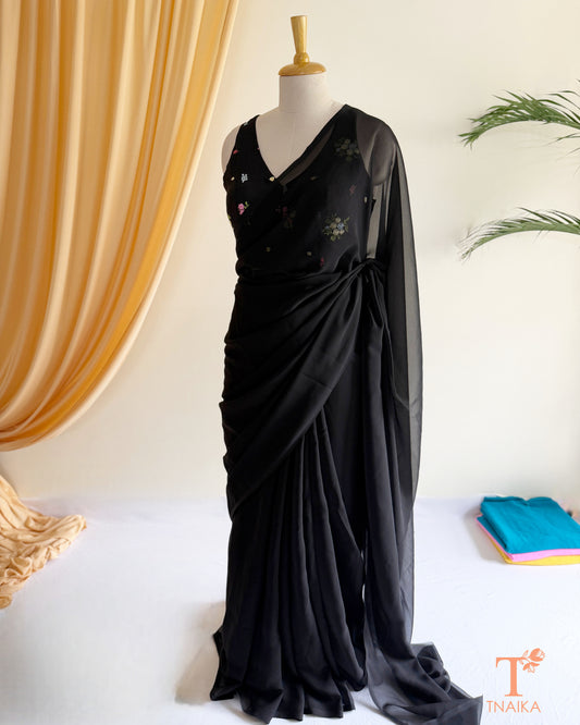 Classic plain georgette saree with a beautiful flowing fall.