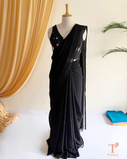 Lightweight plain georgette saree for festive and everyday wear.