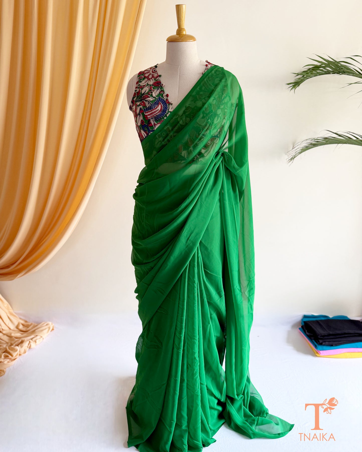 Lightweight plain georgette saree for festive and everyday wear.