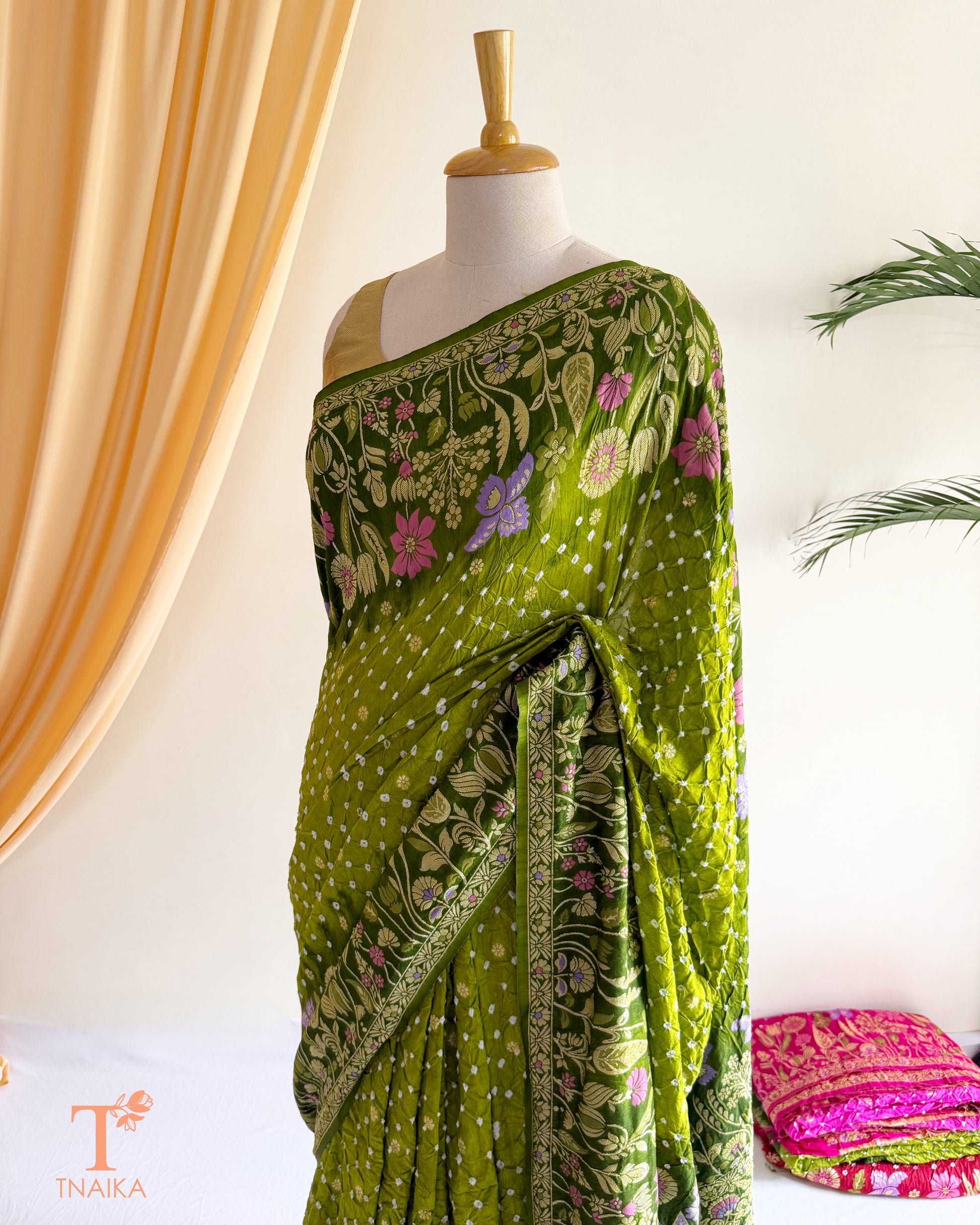 Designer Meenakari woven silk saree with ornate floral craftsmanship.